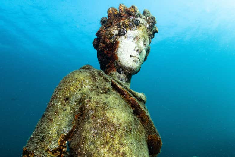 Snorkel amongst Roman statues